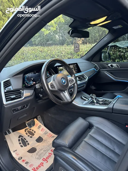 BMW X5 45e 2022 كهرباء بنزين محرك 3000 400 حصان دفعه اولى وشكات 36 شهر بدون بنوك أو مؤسسات