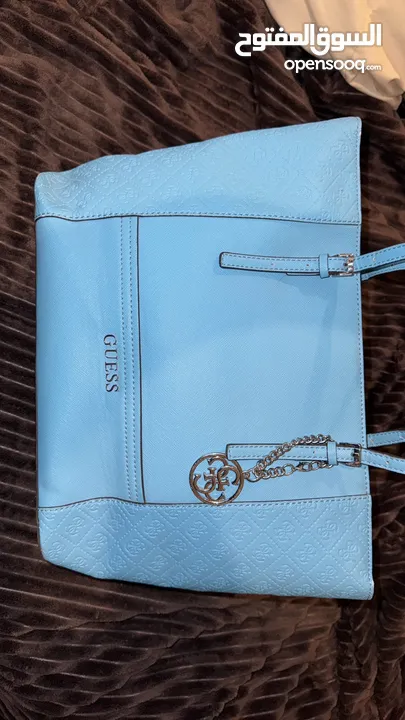 GUESS tote bag...beautiful turquoise color...worn once...like new 35jds