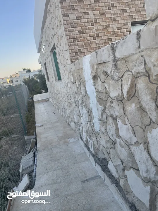 ارض دونم مع بيت ارضي وبيت طابقين
