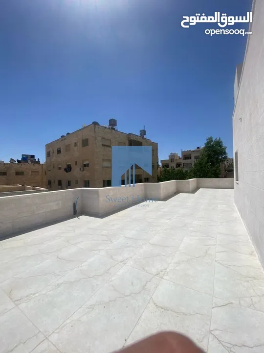 شقة فاخرة للبيع في تلاع العلي  - خلف السلطان طابق ثالث 170م مع روف دوبلكس 173م لم تسكن