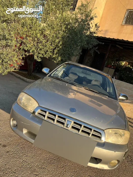 كيا سبكترا 2001 Mr اعلى صنف جير عادي للبيع  مرخصة سنة كاملة ماتور 1500cc  كوشوك جديد