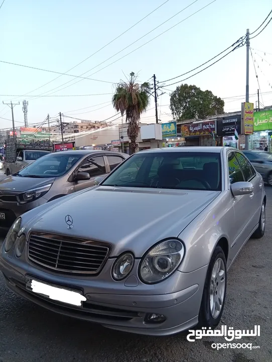 مرسيدس للبدل على احدث e200 كرت ابيض 2004