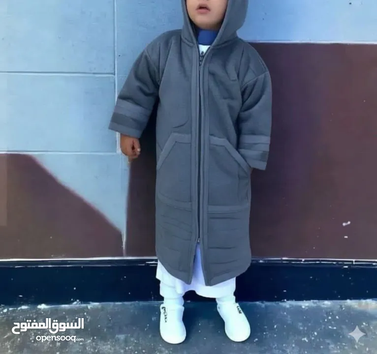 فروة شتوية للأطفال بقبعة مدمجة