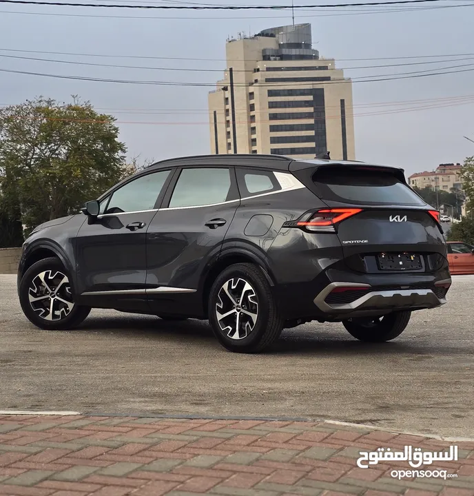 كيا سبورتاج هايبرد 2023 / فل كامل مع بانوراما وفرش مميز غرفه عسليه / عداد قليل / سعررر مميز جداً