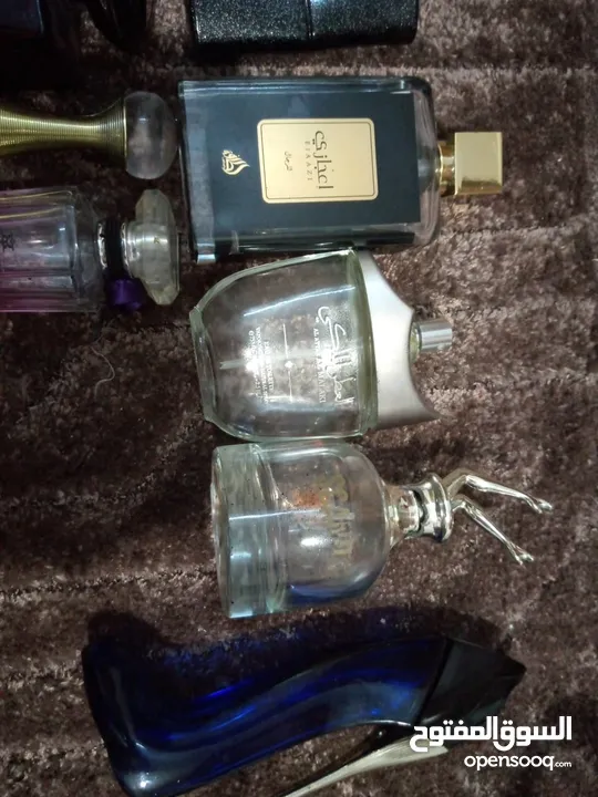 زجاج عطر فارغ اللي عنده ما يبخل علينا