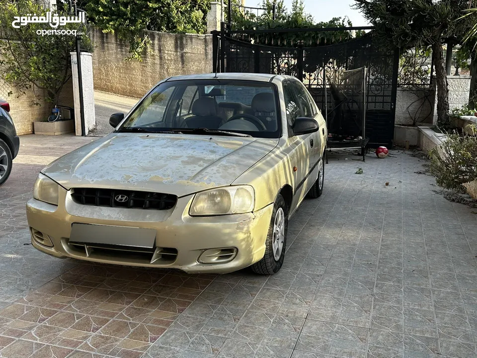 هيونداي فيرنا 2002 بحالة جيدة جداً، جير عادي، عداد 158 الف فقط