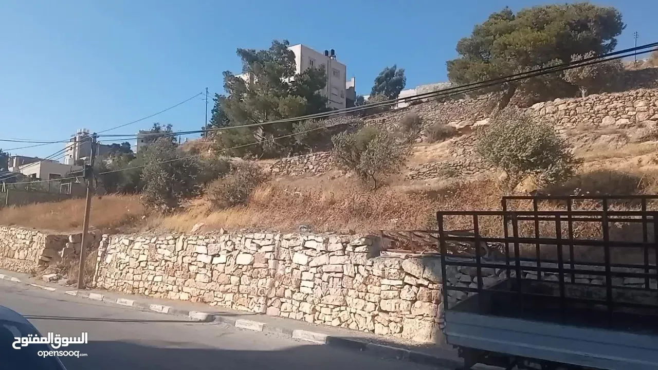 قطعه ارض مع بناء للبيع