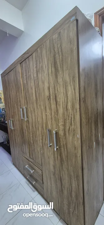 Elegant 6-Door Wooden Wardrobe with Drawers