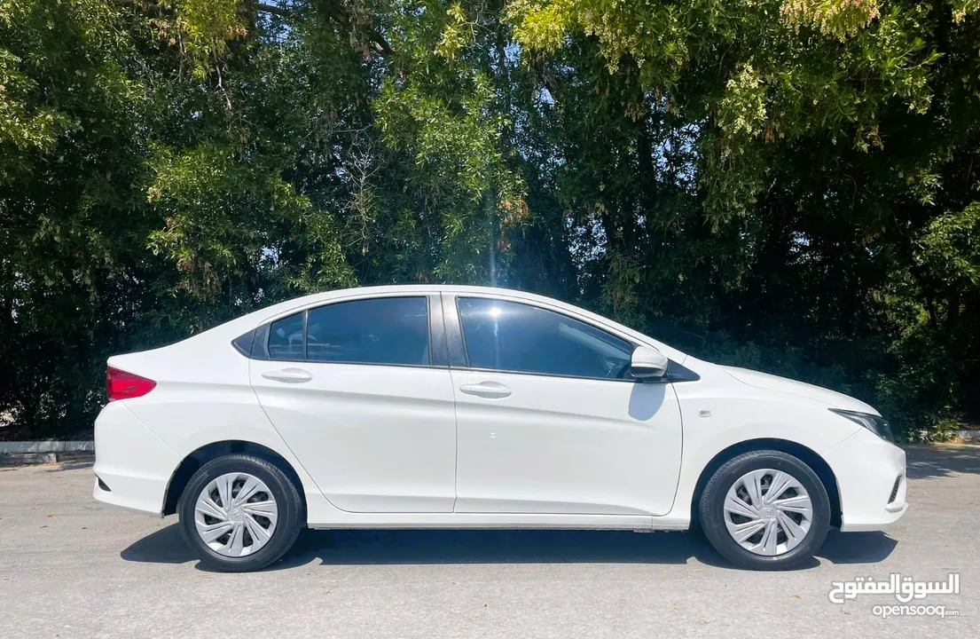 # HONDA CITY ( MODEL - 2019) WHITE COLOR SEDAN CAR 35 66 74 74