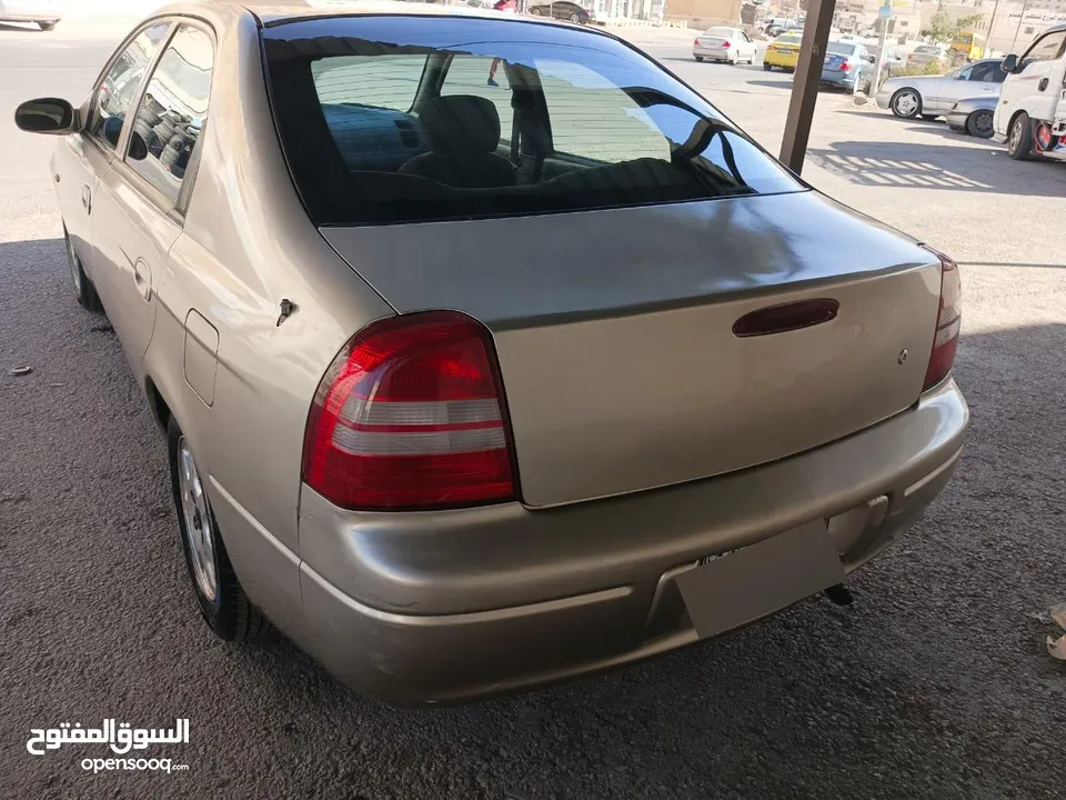 كيا شوما 1998 1500CC  مرخصة لغاية 6 /1/ 2026 لون شامباني  السعر : 2200 دينار