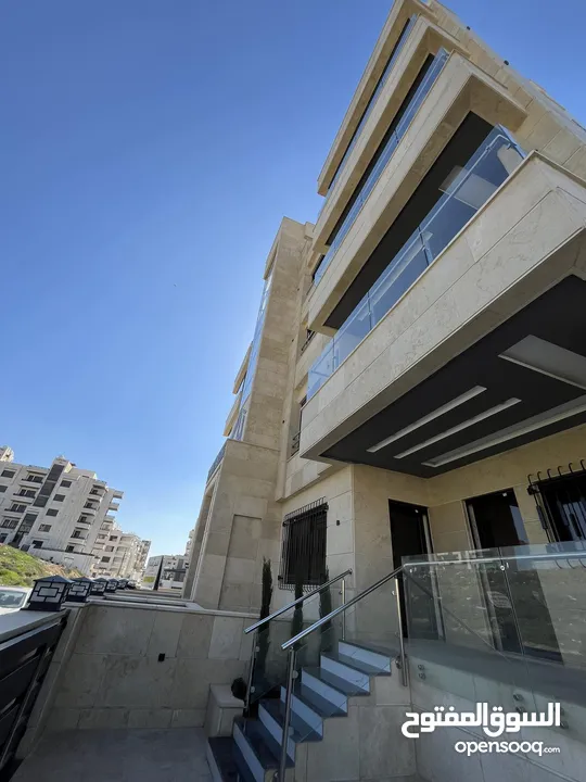 بالاقساط ارضية مع ترس في طريق المطار قرب المدارس العالمية