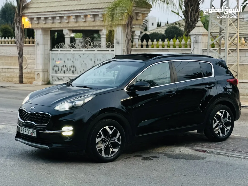 كيااا سبورتاج مطور 2000 بنزين 2*4 الجيب بالكراتين فل اضافات ملغم امكانية البيع نص بالنص الله يبارك