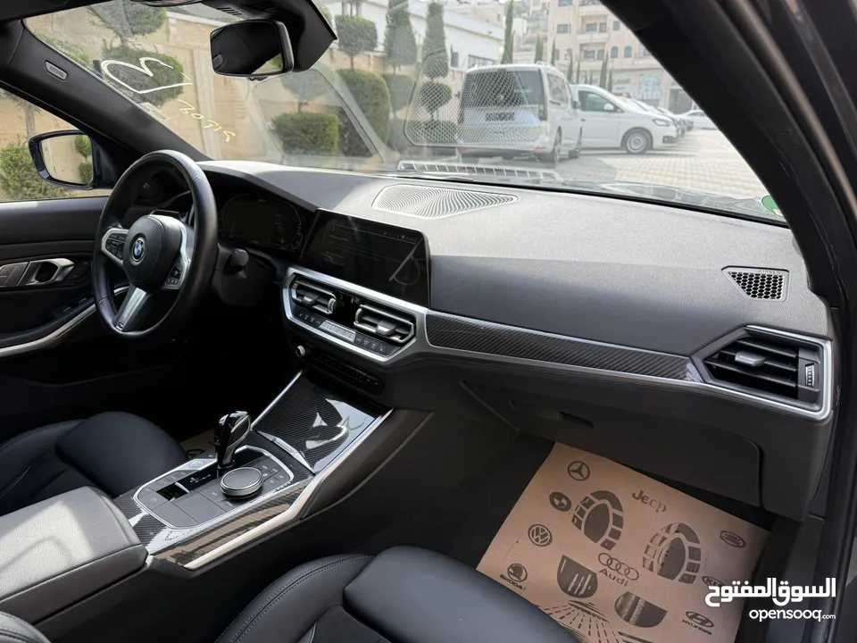 ترخيص 2022 BMW  330e  محرك 2000 هايبرد plug in/يقطع على الشحنه 50 كيلو متر  297 حصان