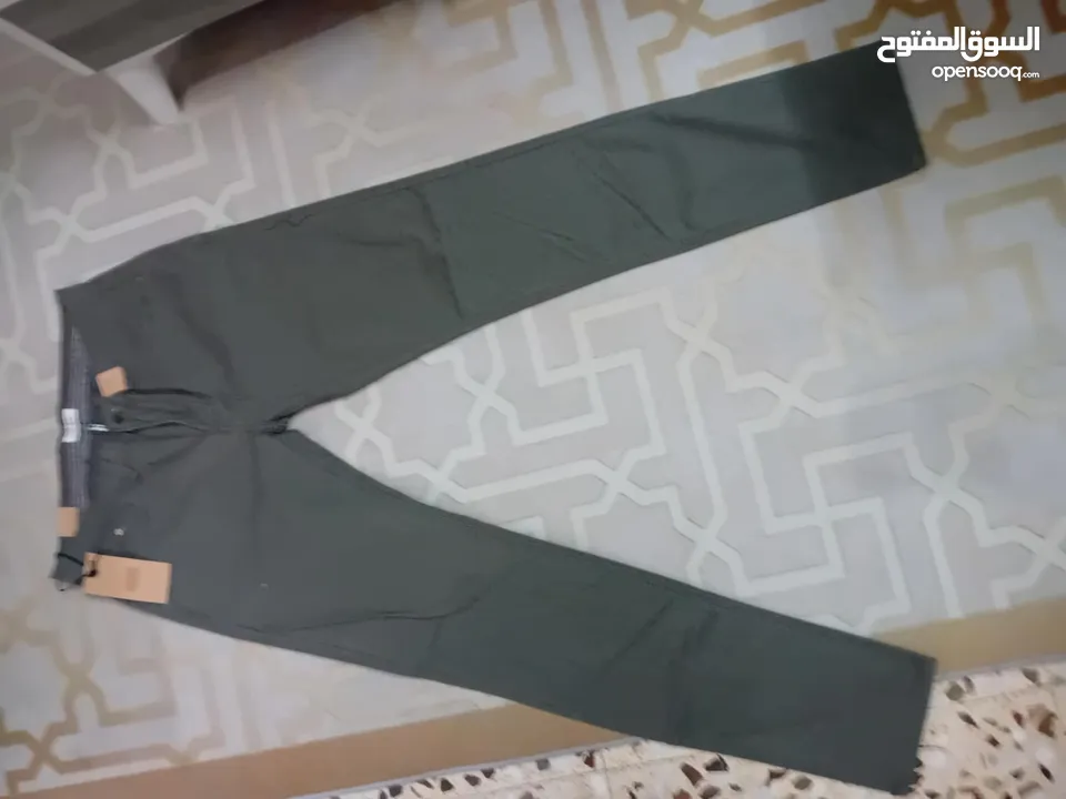 شروات ملابس رجالي بنطلون جينز وكتان وقميص وشرت البضاعه جديد البضاعه صنع تركي وصيني العدد 610