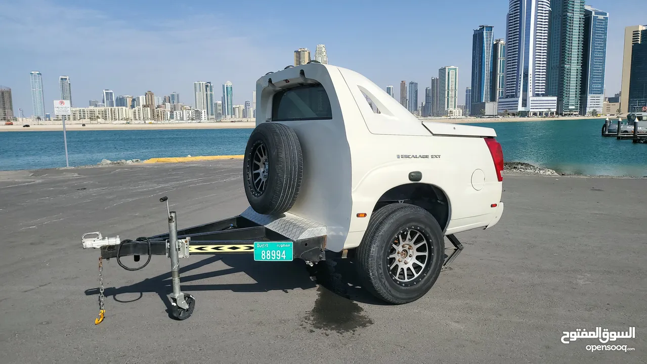 مقطورة للرحلات قابلة للتعديل. Adjustable travel cadillac trailer