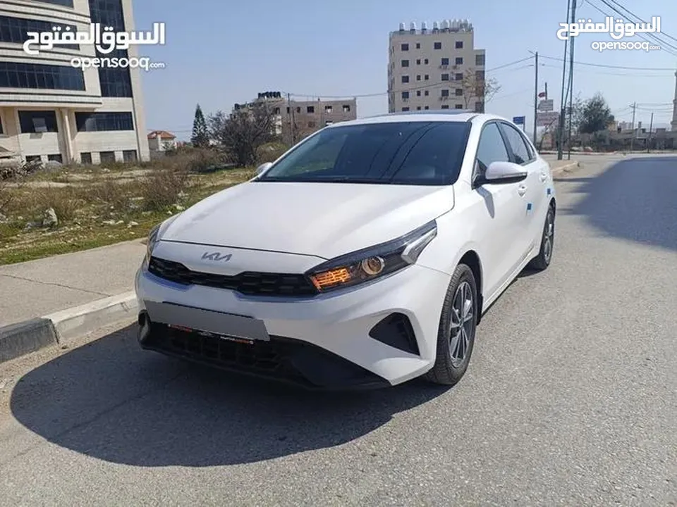 سيراتو k3 2022-2023 بنزين 8800 كيلومتر بحالة الوكالة  دهان الشركة الأصلي