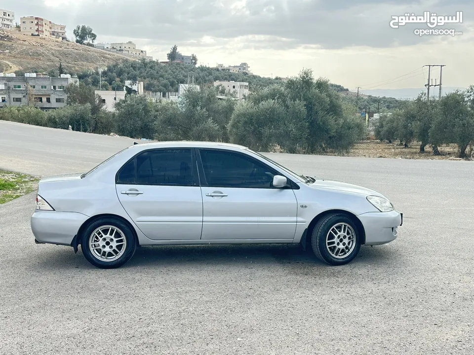 ميتسوبيشي لانسر 2007 ماتور 16 اتوماتيك  / وارد الكويت فحص كامل / كاش أو اقساط