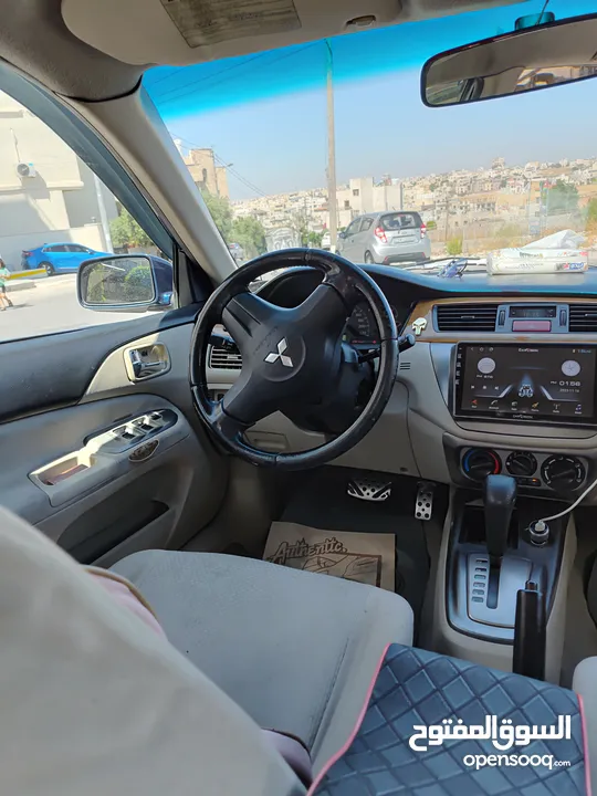 متسوبيشي لانسر GLX 2007 1600 cc وارد الخليج الكويت جميع الإضافات بإستثناء الفتحه وجنط إضافي.
