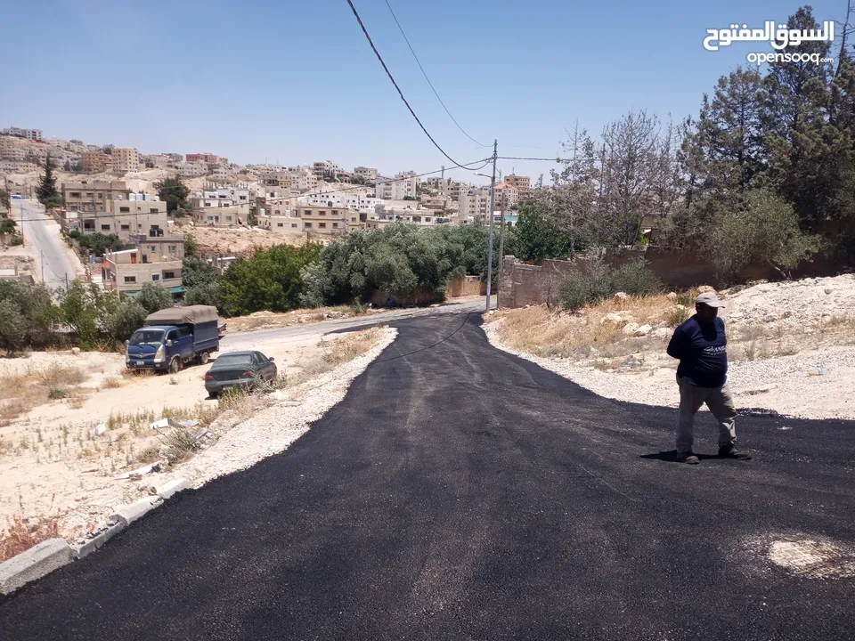 تعهدات عامة وهدم مباني ونقل جميع أنواع مواد البناء ونقل تراب أحمر وتعبيد الشوارع بأفضل أنواع الخلطة