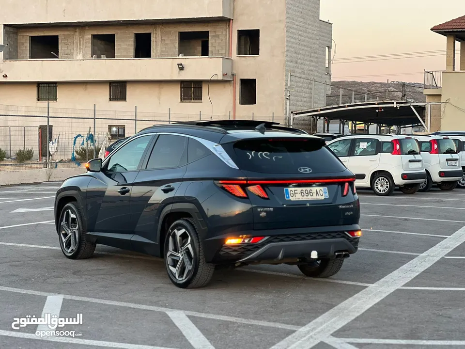 هونداي توسان/2022 Plug In فل الفل فتحة سقف بانوراما  4x4 ///271Hp   ( Haybrid) 1600cc