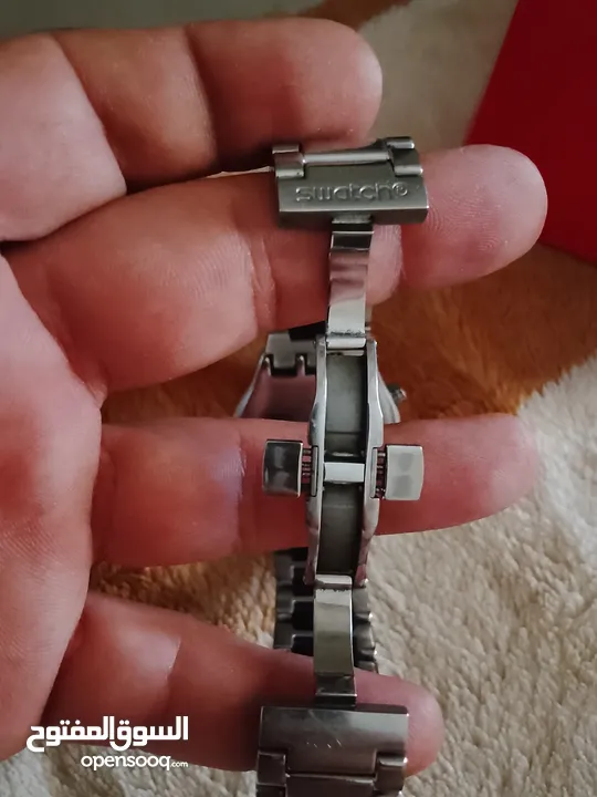 ساعه سواتش مع كفالتها وكرتونتها جديده بحالة الوكاله للبيع