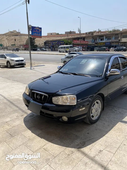 هيونداي افانتي xD لون اسود مميز ميتالك  موديل 2000