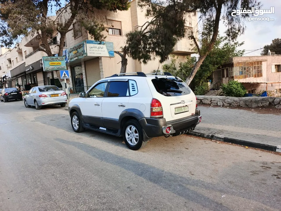 جب توسان 2005بصلاة على النبي الجب بوضعية ممتازة قوة متور 2000 +16صباب مو 20 متور وجير ممتاز