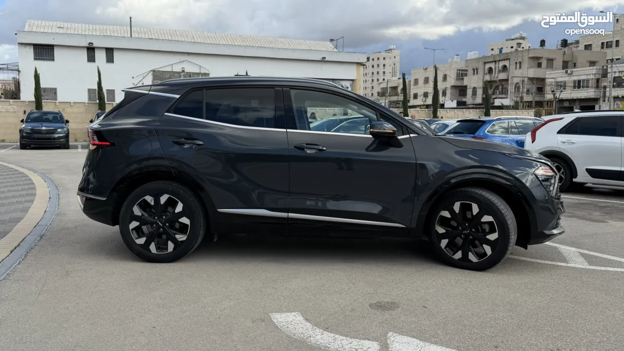 كيا سبورتاج ترخيص 2022 محرك 1600 هايبرد plug in/يقطع على الشحنه 65 كيلو متر  271 حصان
