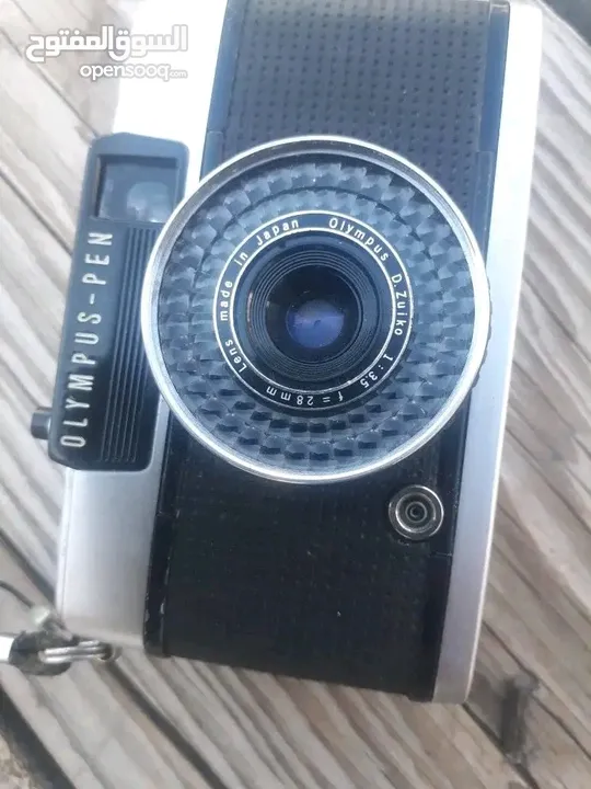 polarid sx70 & OLYMPUS & KODAK DISC