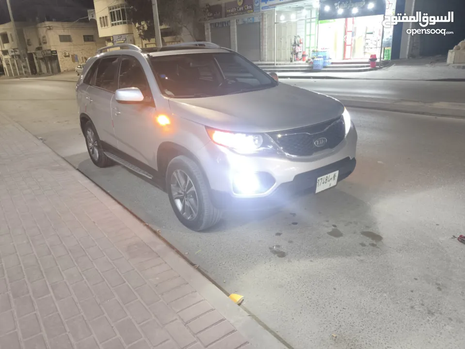 كيا سيرنتو4×4ديزل متور2200 فول اضافات فتحه بانوراما هوك مسجل بترخيص