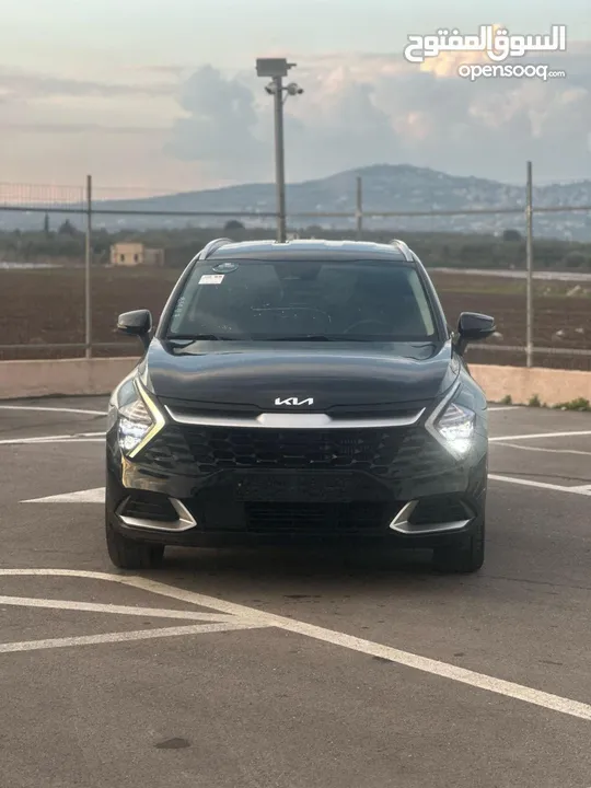 كايا سبورتاج /2022 فل بدون فتحة سقف 2x4 ///240Hp بنزين + كهرباء ( Haybrid) 1600cc