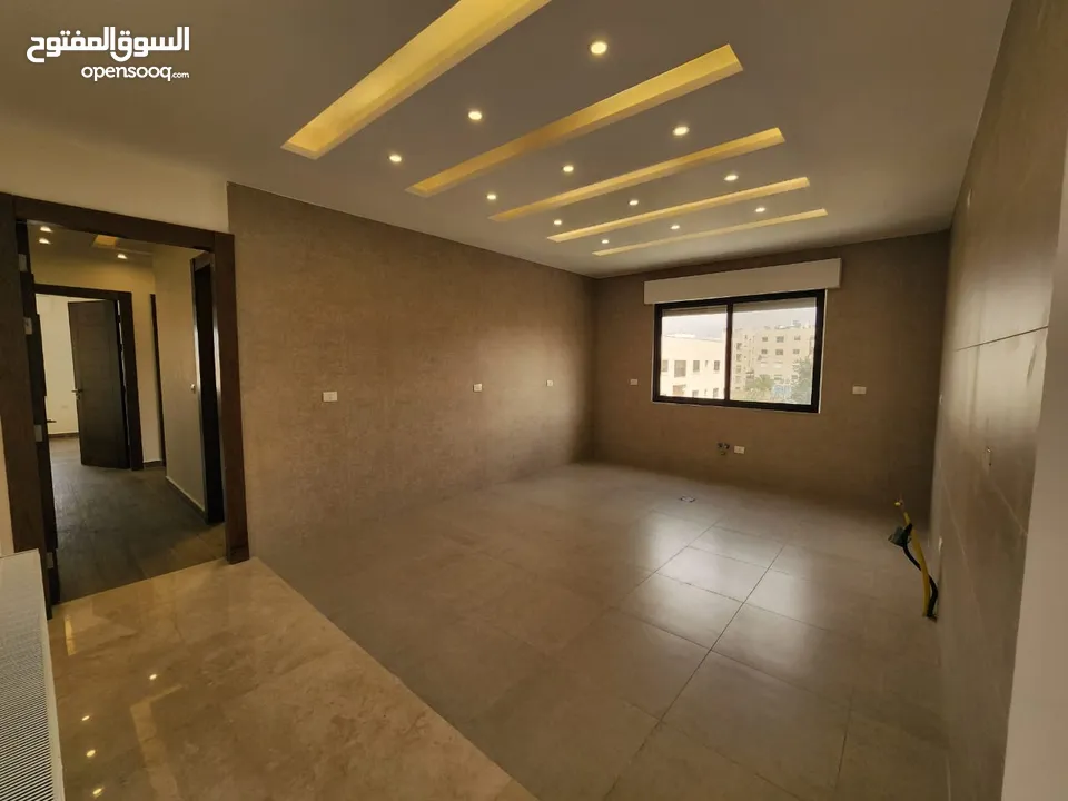 شقة طابقية للبيع في حي الصحابة - ref : 14579