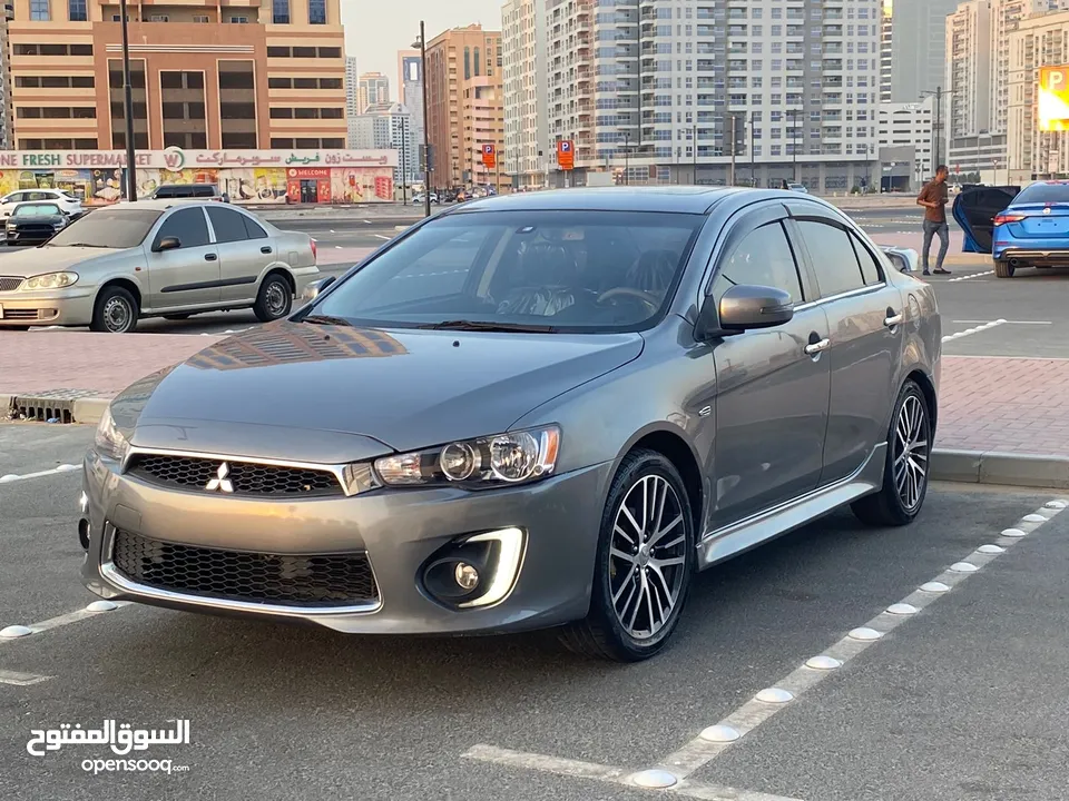 2016 Mitsubishi Lancer GT. Excellent conditions beautiful car for sale in Dubai. Al Nadha.