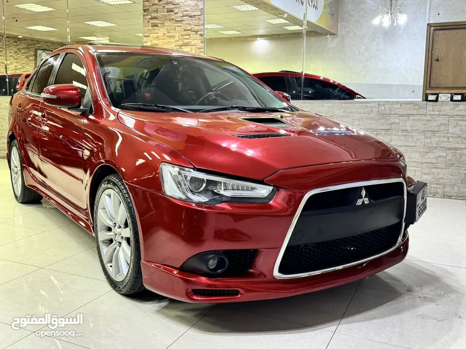 ميتسوبيشي لانسر موديل 2015 GT اصلي فحص كامل بحالة الوكاله فل كامل اعلى صنف من فئتها