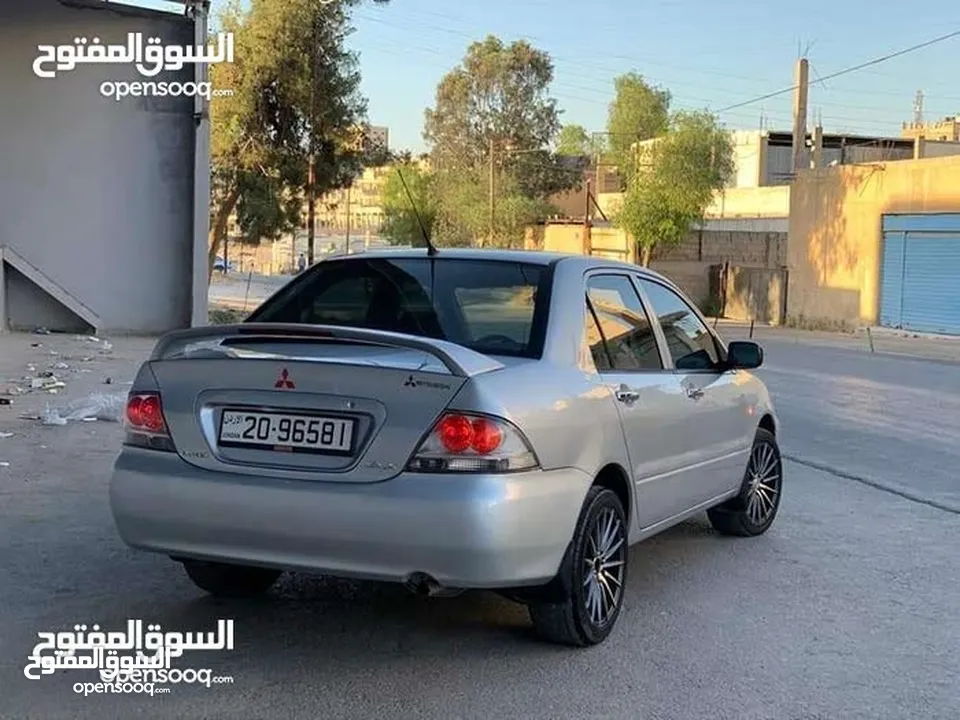 Mitsubishi 2011 فل كامل****بدون فتحه.  وارد الشركه.