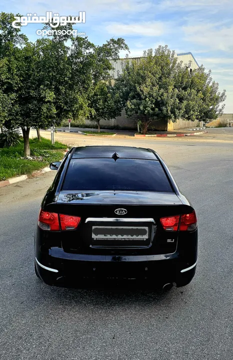كيا فورتي فل مع فتحه سقف وبصمه 2011 اصل برايفت