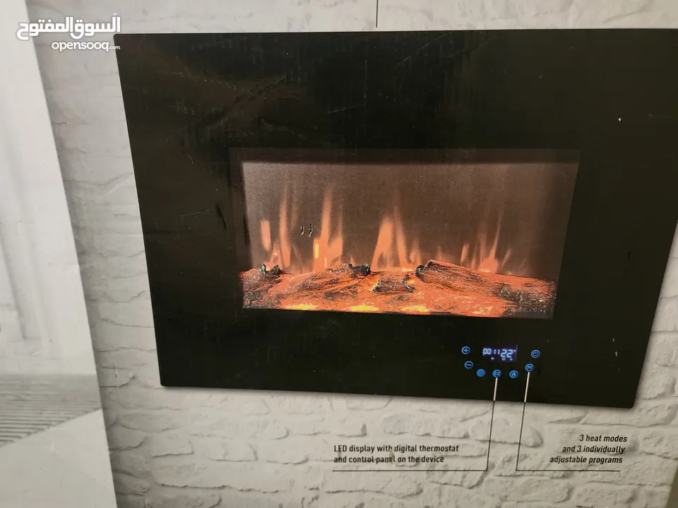 مدفأة كهربائية على شكل fire place جديدة من لندن تعمل على الريموت