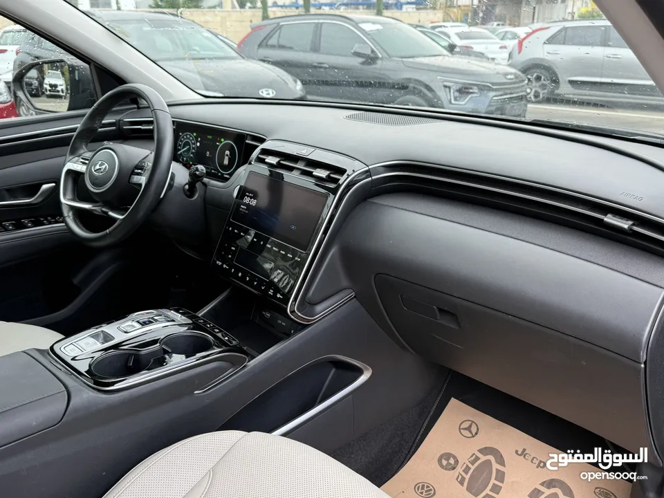 هونداي توسان ترخيص 2022 محرك 1600 هايبرد plug in/يقطع على الشحنه 65 كيلو متر جير أوتوماتيك