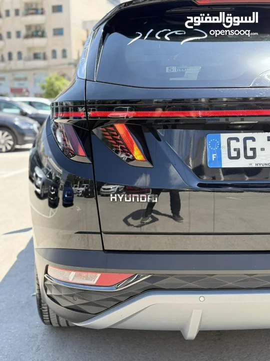 هونداي توسان ترخيص 2022 محرك 1600 هايبرد plug in/يقطع على الشحنه 52 كيلو متر