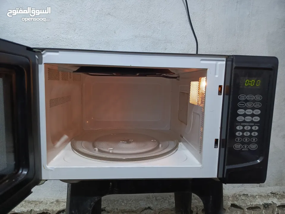 ميكرويف سونا 45لتر لون اسود مع نظام شواي داخليه بحال الوكاله قابل للتفاوض يوجد توصيل