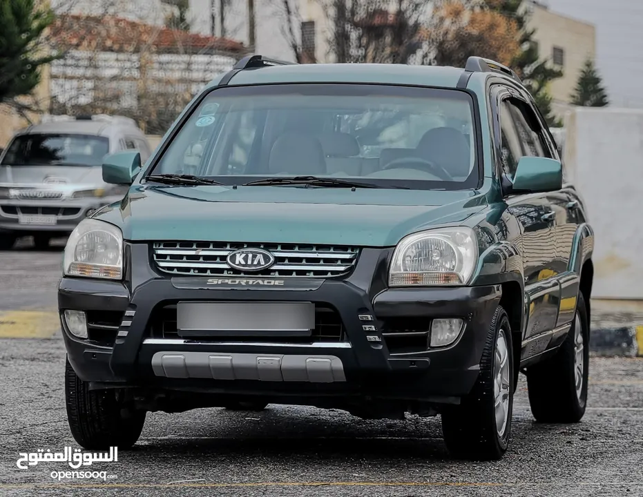 كيا سبورتاج بحالة ممتازة Kia Sportage 2006