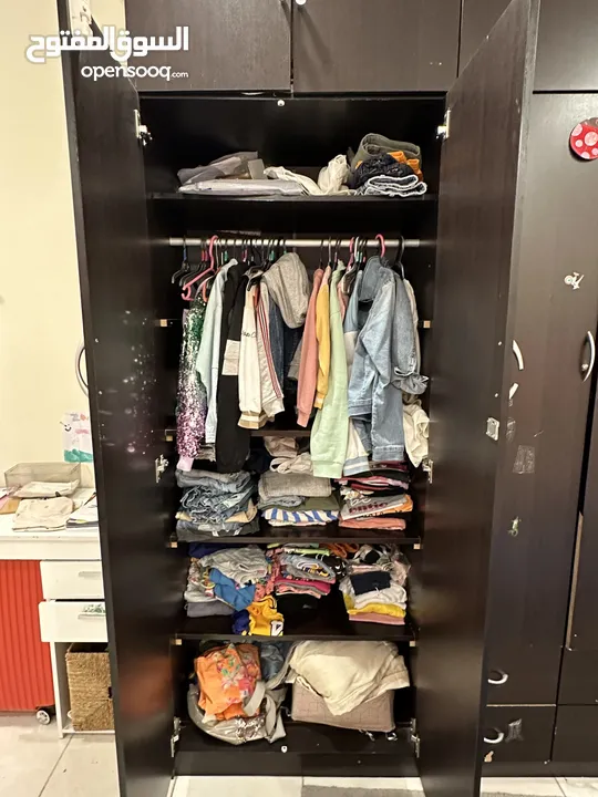 Brown cupboard with additional racks