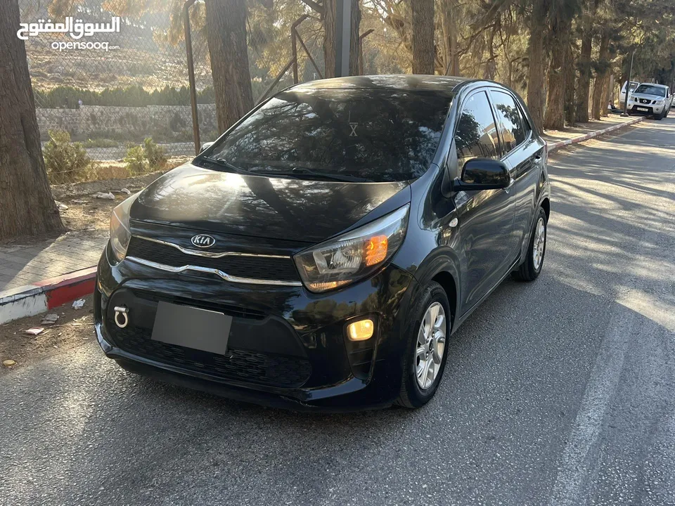 سيارة للبيع كيا مورننغ باللون الاسود المميز ،،،، سعر مغري ع الكاش