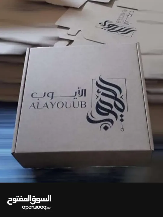اكياس ورقية وكرتون مع شعار مغلافات وظروف ورقية