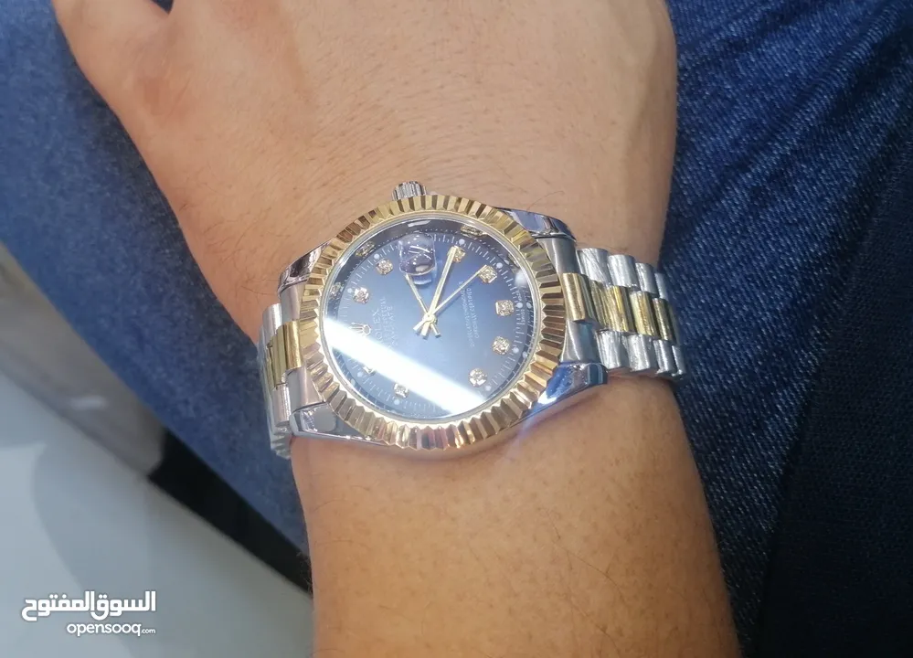 Rolex Datejust   Stainless steel, polished finish, signature lens, round face, perforated bezel, log