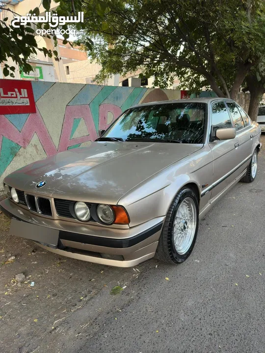 BMW e34 520 للبيع