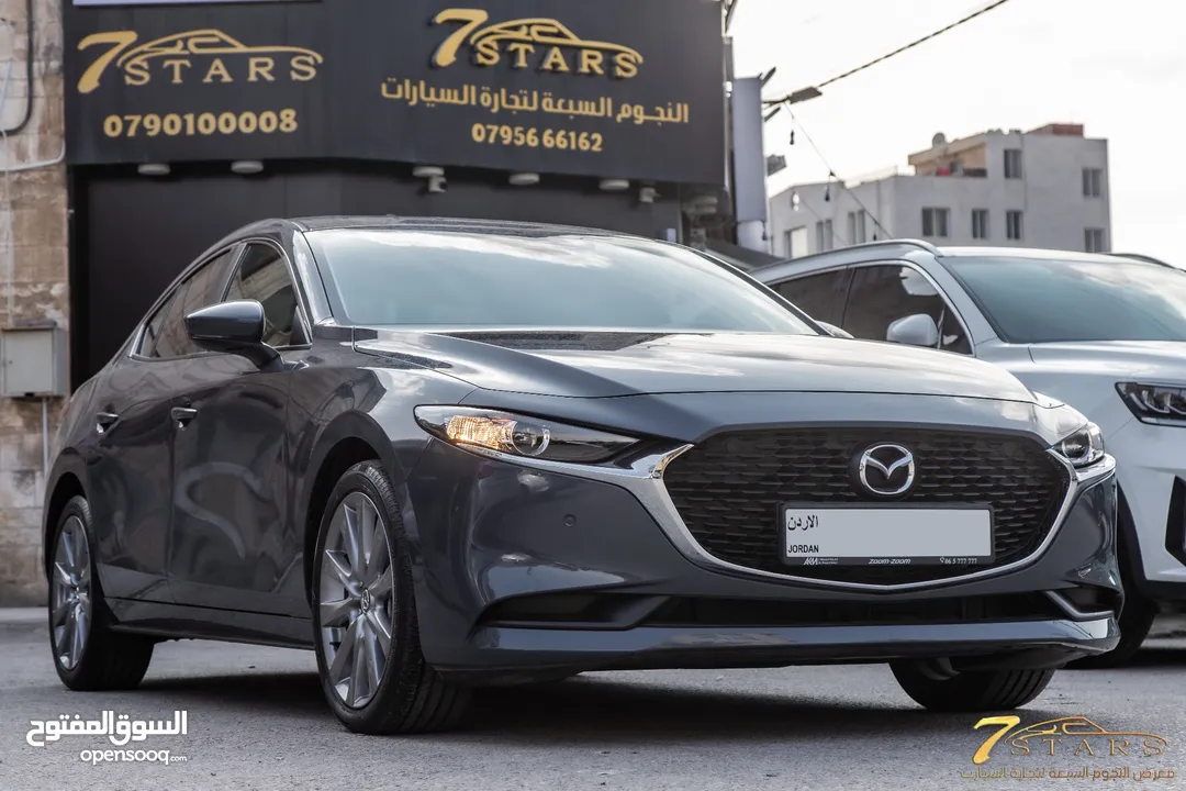 Mazda 3 2023 Skyactiv   السيارة وارد و كفالة الشركة و صيانة الشركة و قطعت مسافة 11,000 كم فقط