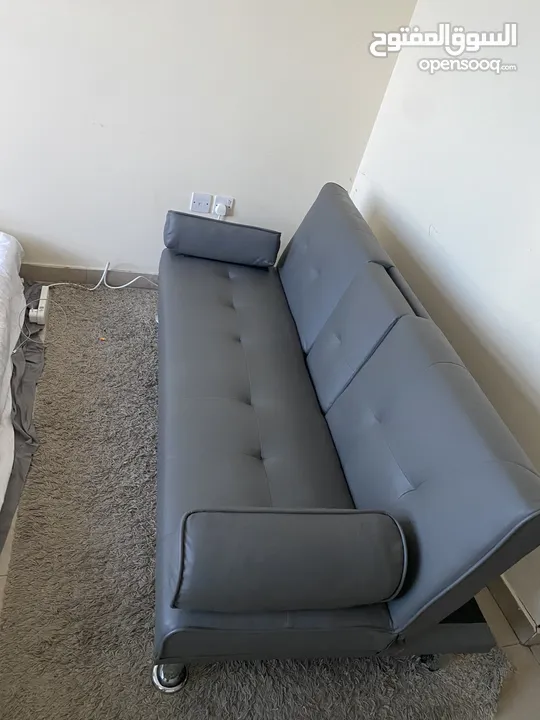 Almost New Convertible Sofa bed with coffee cup holder