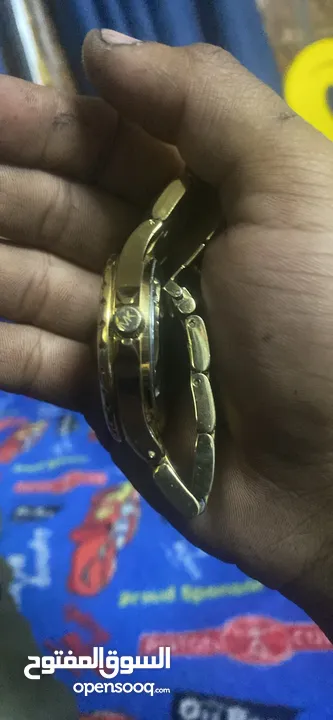 ‏ساعة مايكل كورس