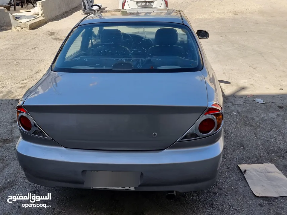 كيا سبيكترا 2001 بسعر 2400 جير عادي سياره نظيفه جدا  kia spectra 2001